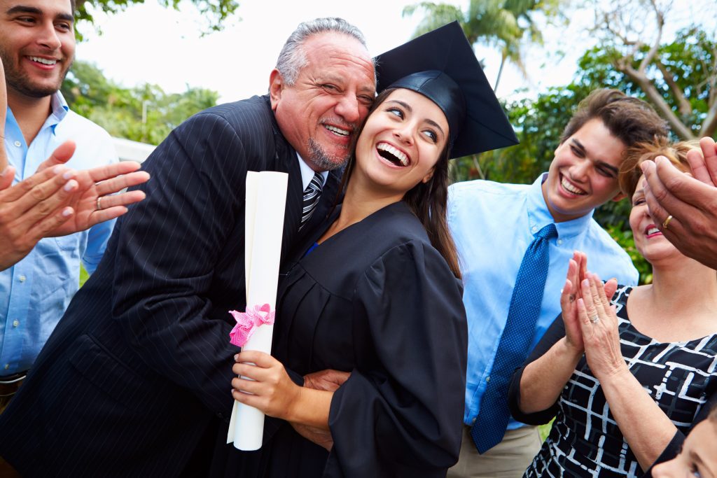 Parent celebrates child graduation after seeking school placement consultant for admissions advice